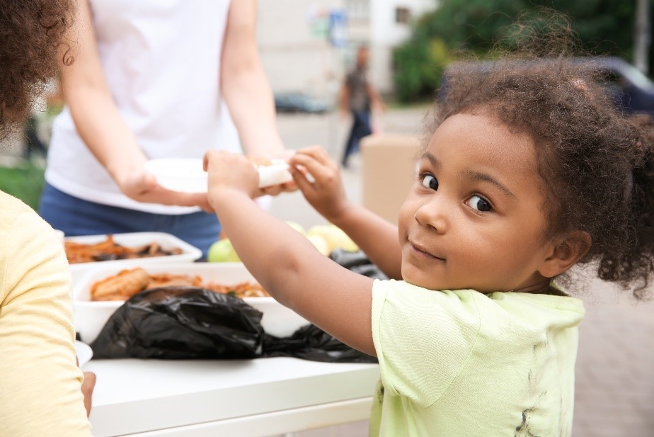 Child gets food.
