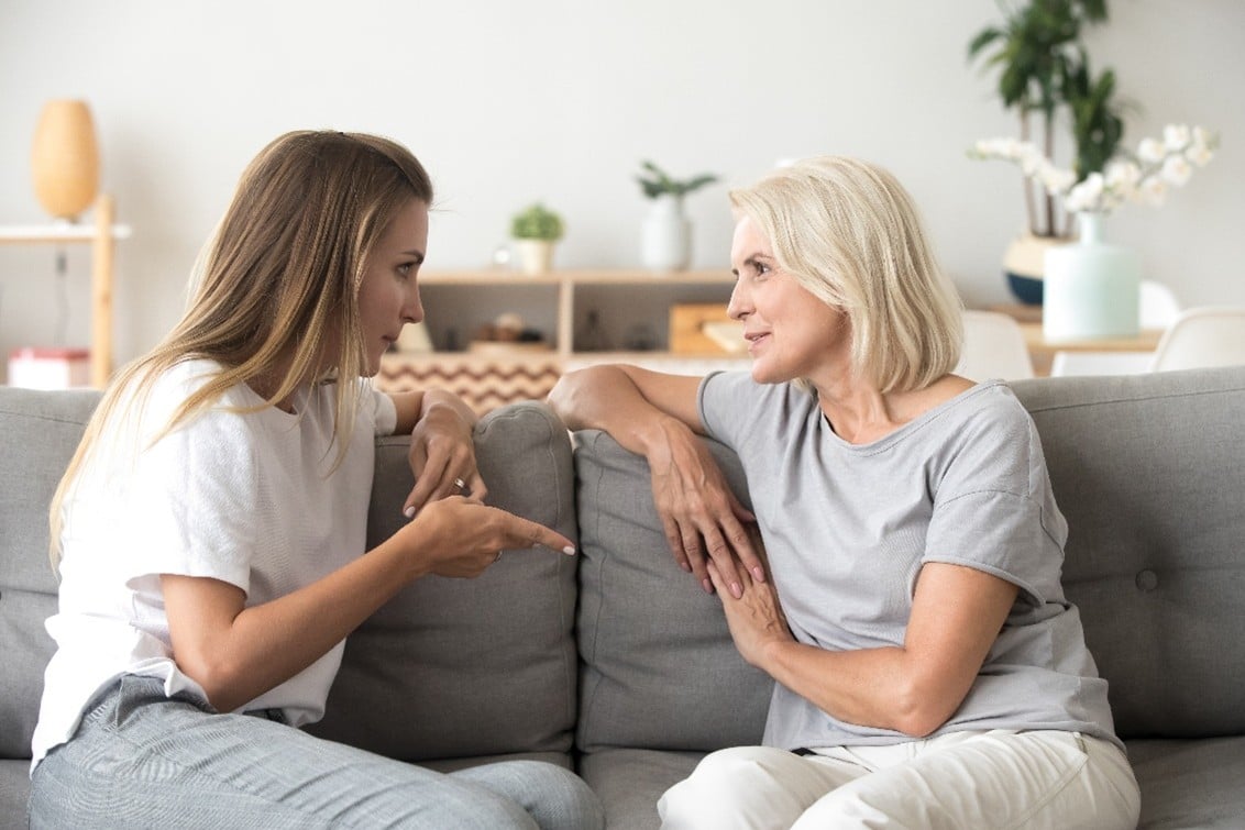 Mother and daughter talking